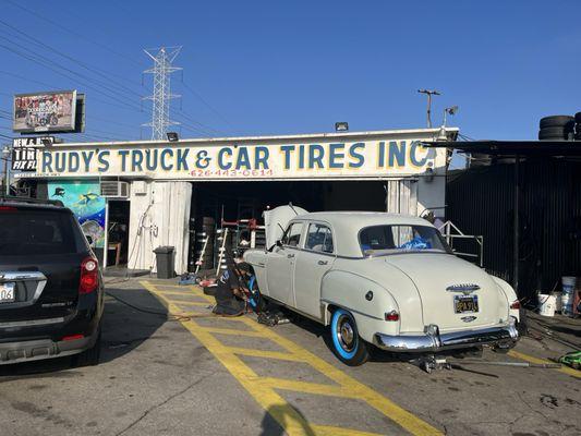 New Diamond Back wide whitewall tires being installed on my '52 Plymouth