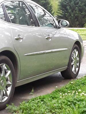 My car, a 2006 Buick Lacrosse I'm proud to own. I was able to pay cash for it.