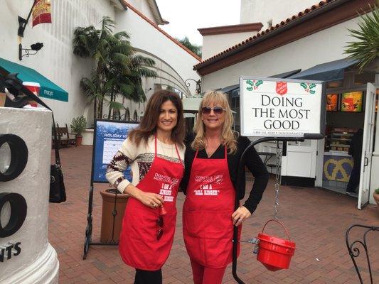 Ringing the bell for The Salvation Army with fellow Kiwanian Angela