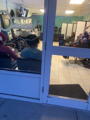 Jesula's not following CDC guidelines. Customers not being serviced just sitting in the salon. No temperature checks, stylist with mask down