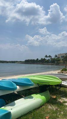 Beach area where kayaks are stored