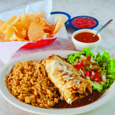 Chuy's steak burrito with chips and salsa