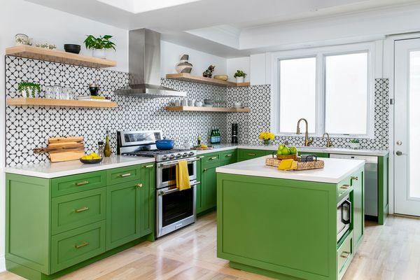 Discover the renovated kitchen in this two-story Pasadena townhome, part of a renovation which includes the living area and upstairs spaces.