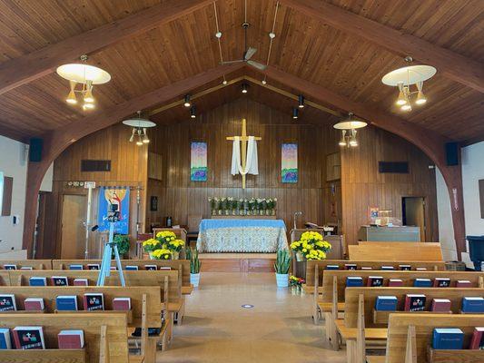 The church interior greened for Easter Season.