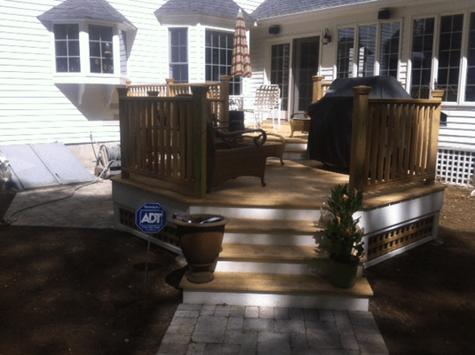 Complete custom built 2 level deck using pressure treated decking with hidden fasteners and fir railings.