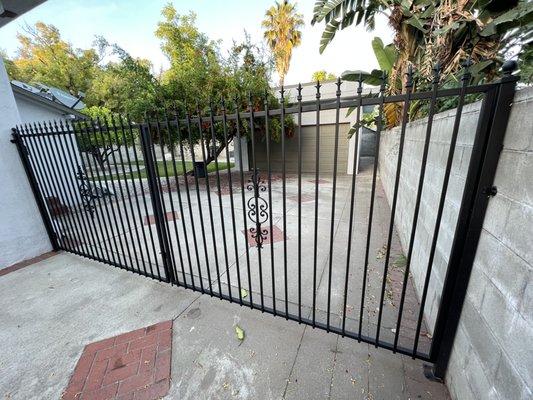 new iron gate fabrication and install, powder coat finish