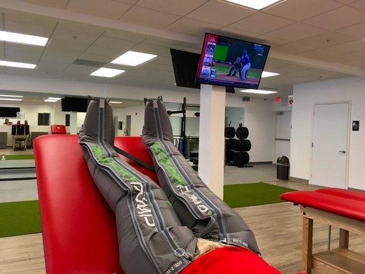 Watch sports on the big screen TVs while enjoying a RecoveryPump session. RecoveryPump's sequential compression expedites recovery by increa