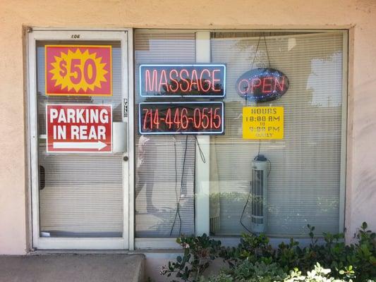 Parking in rear like the sign says.