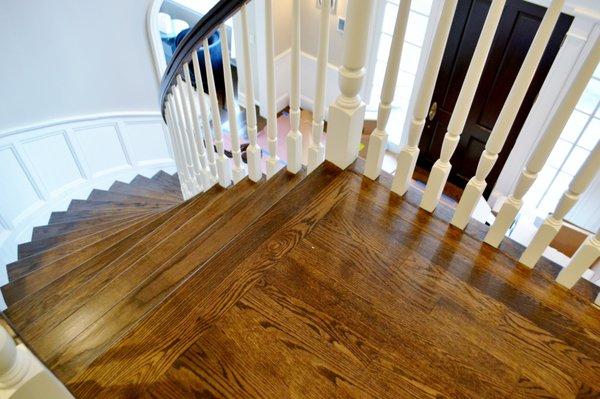 Clean and flawless spindles grace an elegant staircase.