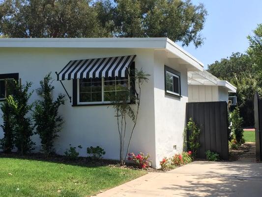 Love the Mediterranean awning on this cute beach cottage in Del Mar. Adds a perfect amount of curb appeal.