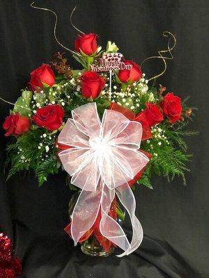 Celebrate your love this Valentine's Day with a dozen long stemmed red roses to say I Love You!