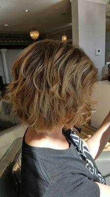 Short bob with layers and honey hilites