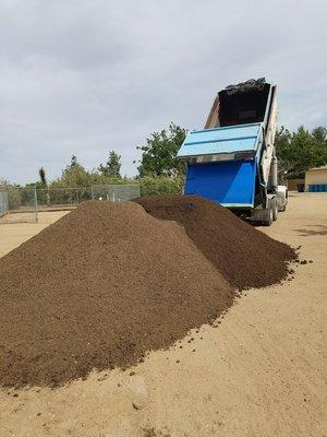 We deliver Mushroom mix soil for your veggie gardens and fruit trees.