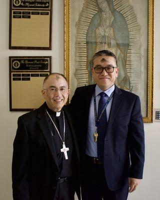 Principal Kim with longtime friend, Bishop Nunes