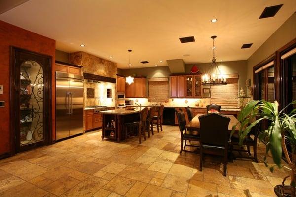 Great Room / Kitchen including Low Voltage Can Lighting, Pendants, Under Counter Lighting, and Chandeliers.