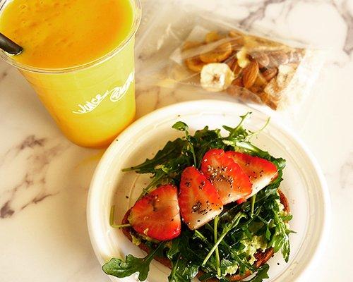 Quick Healthy Snack. Mangorama Smoothie, Avocado Toast, Arugula Salad, Strawberries, Ginger Almond, Banana Snack Mix.