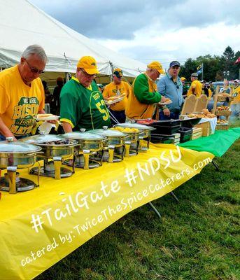 North Dakota State Tail-Gate Party, w/ over 300 enjoyed links, brats, hot dogs, beef, turkey & vegan burgers, salads, beans, corn, dessert.