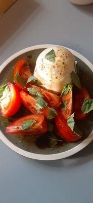 Burrata... Local farmers tomatoes, fresh basil, Italian extra virgin oil and fig balsamico.