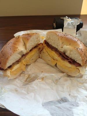 Turkey bacon, egg and cheese on a poppy seed bagel