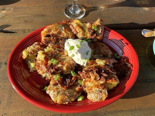 Cheese covered smashed potatoes (it has a better name than that but I forgot what it was). These are on the starters menu.