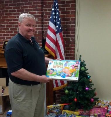 Our CEO championing the Toy Drive!