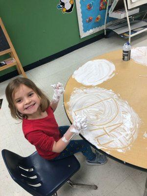 Practicing writing their names