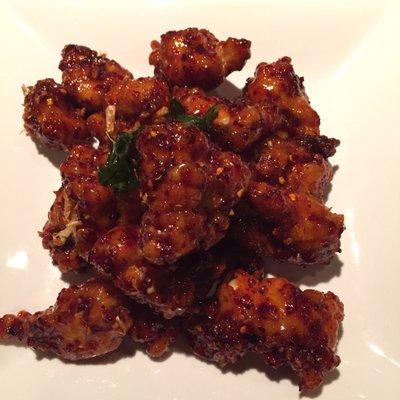 Crispy Garlic Chicken. It may look like any old Chinese dish, but it's not! Very crispy, interesting sweet/ spicy flavor.