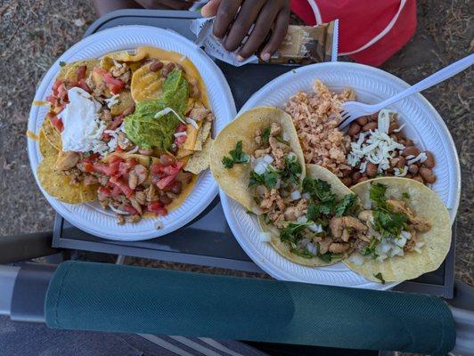 Nachos with meat. Chicken tacos with beans and rice.