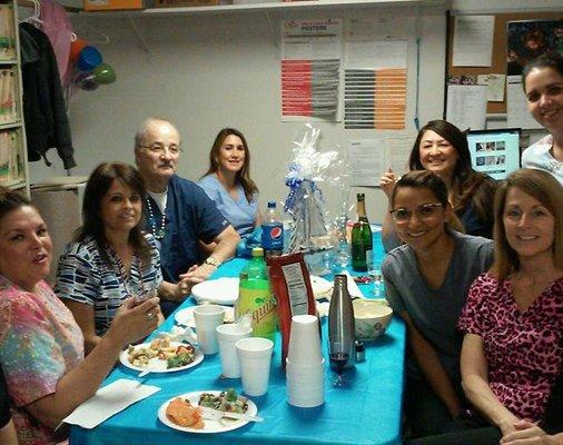 Our staff celebrating with a holiday lunch