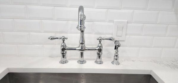 Kitchen faucet installation and garbage disposal installation