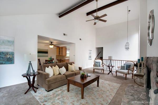 Inside of the Town Home after being staged for sale, looking towards dining area and kitchen.