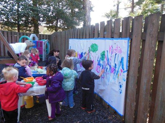 Taking turns at the mural during spring celebration!