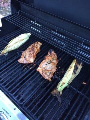 Brown sugar marinaded NY Steaks. Corn on the cob.