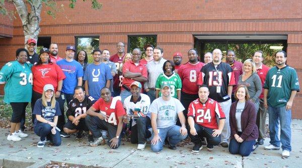 Some of our employees celebrating "Football Friday" at our headquarters in Alpharetta, GA