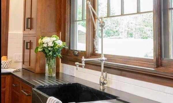 Soapstone countertops w/ grooves, subway tile backsplash, Doug Fir vertical grain window trim, and oak quartersawn cabinets