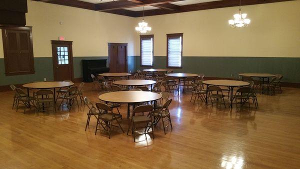 Dinning room shown with table setup. It is an example layout.