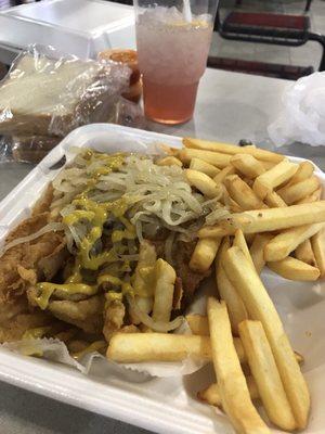 Fried catfish topped with mustard & onions.