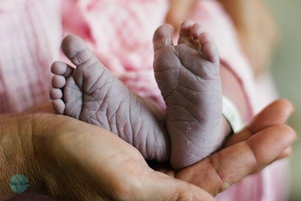 Photos of baby feet MIGHT be cliche but these feet will never look the same after his or her birth day.