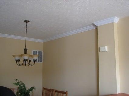 We installed crown molding in these two rooms to bring a more homey and formal feeling to these spaces