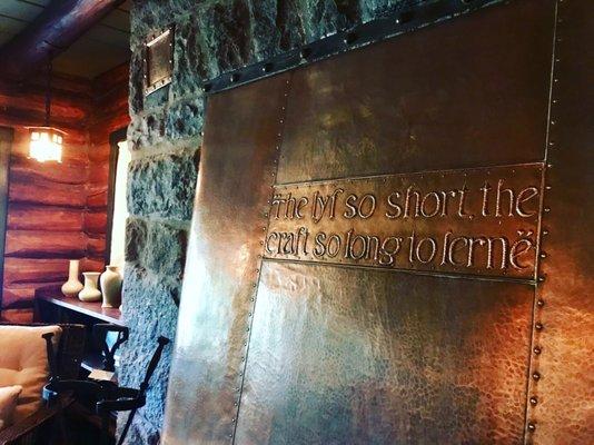 One of the many beautifully inscribed fireplaces in the Stickley home.