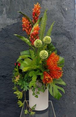 Our luxe silk tropical arrangement won't wilt in the summer heat