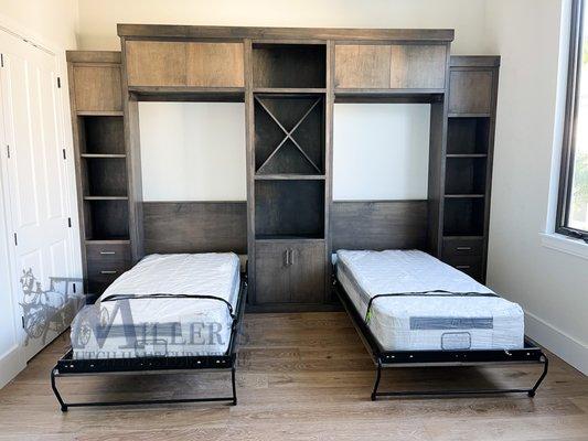 A custom built in Murphy bed unit designed by our cabinetry department. Available in custom set ups, sizes, woods, and stains.