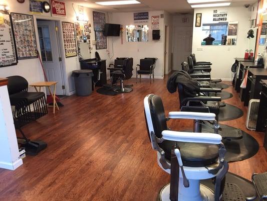 An awesome clean professional atmosphere . A great place to get a haircut .