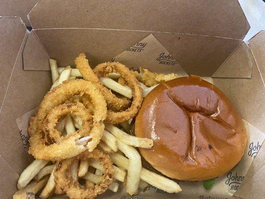 This burger was 1" thick including the bun and completely flavorless.  Really lame onion rings and fries!