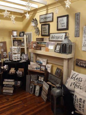 We have a nice selection of signs and home decor