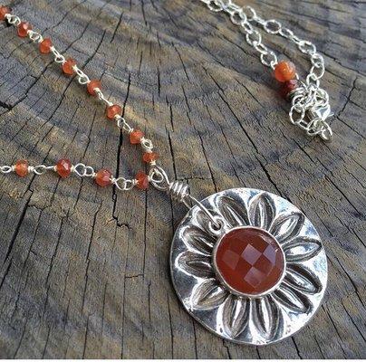 The Studio fine silver pendant with sterling silver and Carnelian.