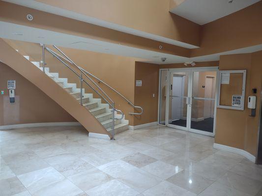 Foyer - to the right are the double doors to the hallway leading to doctor's office