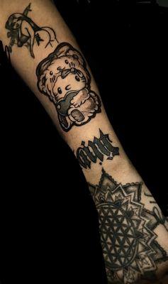 Hello kitty tattoo
Black and grey work