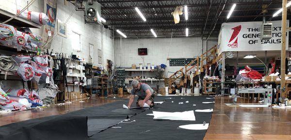 Class 40 mainsail coming together for #54,  This one is at the bottom of the ocean, along with the rig, somewhere near Antigua.