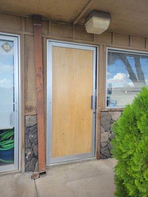 Entrance is this wooden door